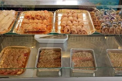 Involtini e preparati di mare a Messina pronti da cuocere esposti alla Pescheria Morello